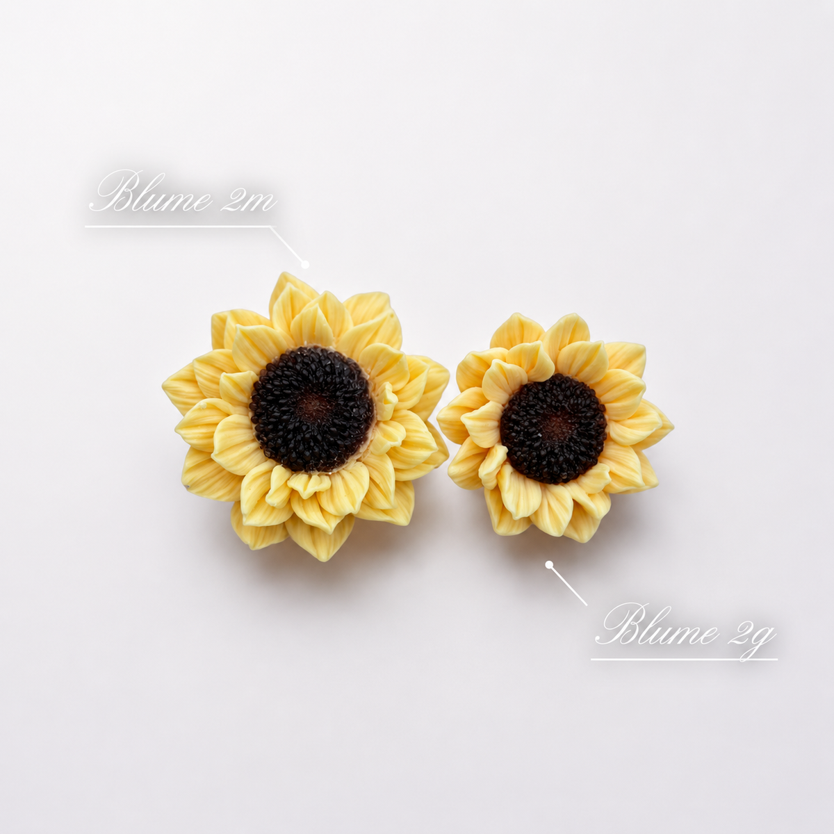 Gegossene Sonnenblumen 2g und 2m aus 3D-Silikonformen im Größenvergleich